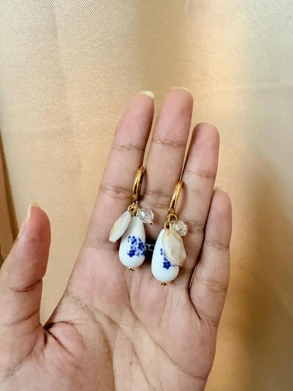 Blue Floral Drop Earrings top view of too dramatic