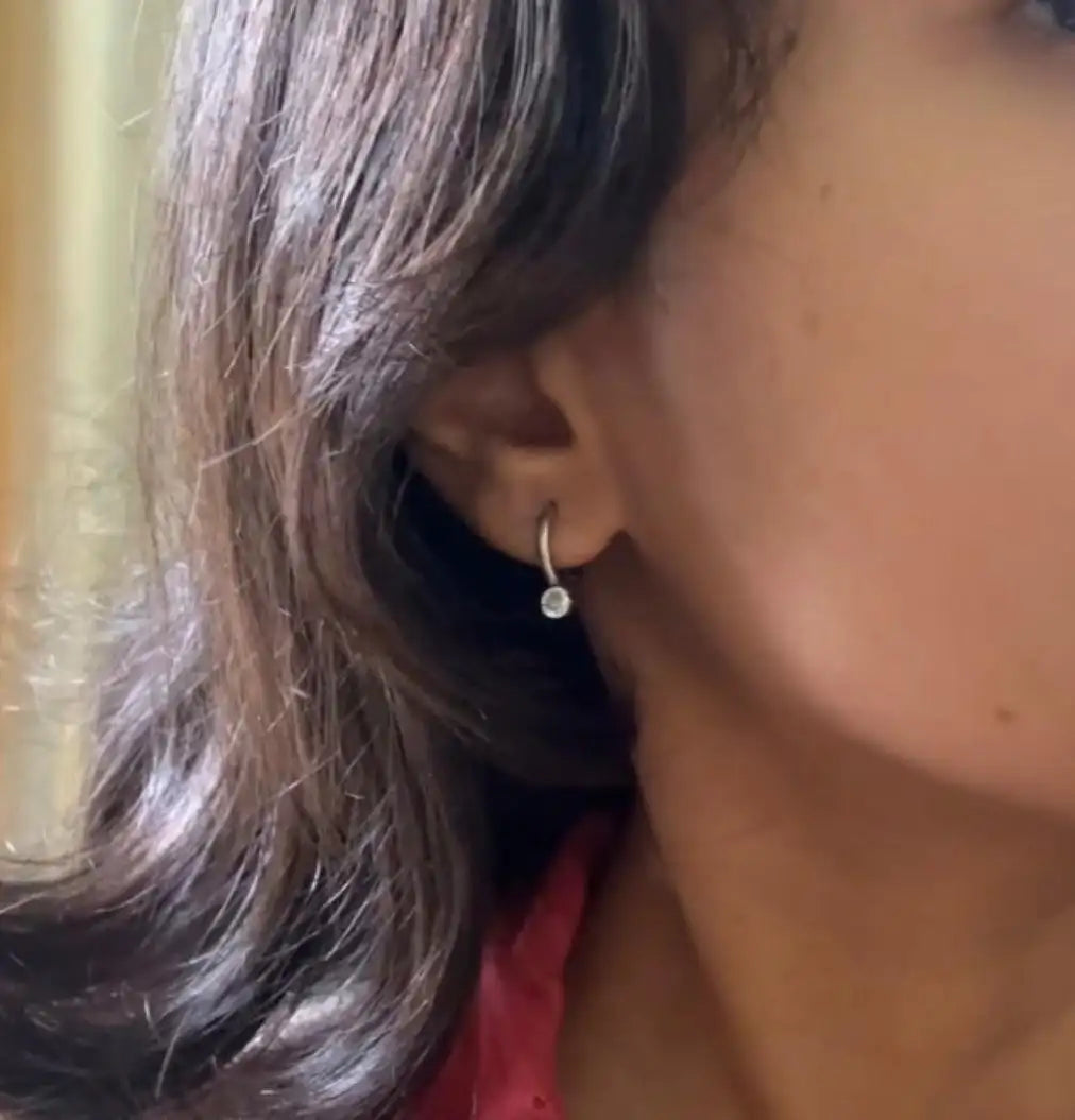 Crystal stone hoop earrings, side view is too dramatic